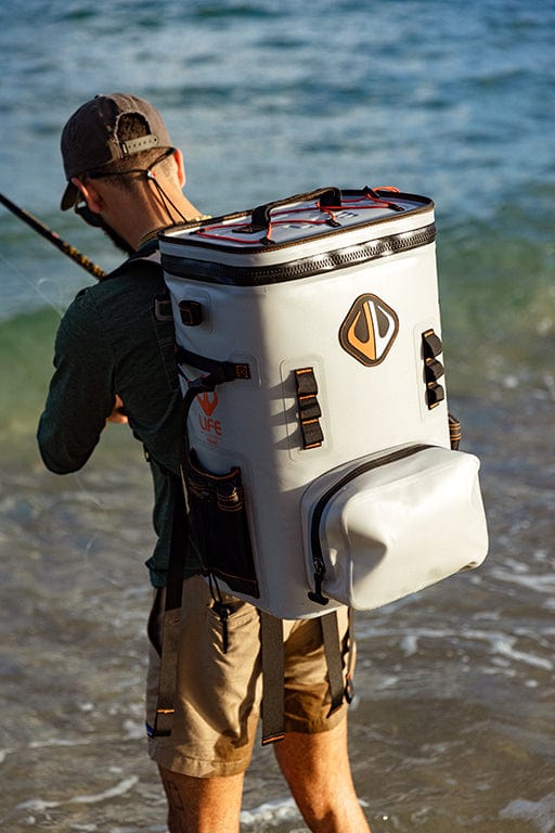 Large outdoor cooler backpack by Life League Gear, featuring insulated compartments and adjustable straps for outdoor use.