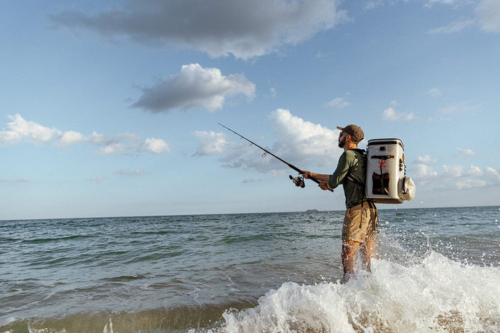 Large outdoor cooler backpack by Life League Gear, featuring insulated compartments and adjustable straps for outdoor adventures.