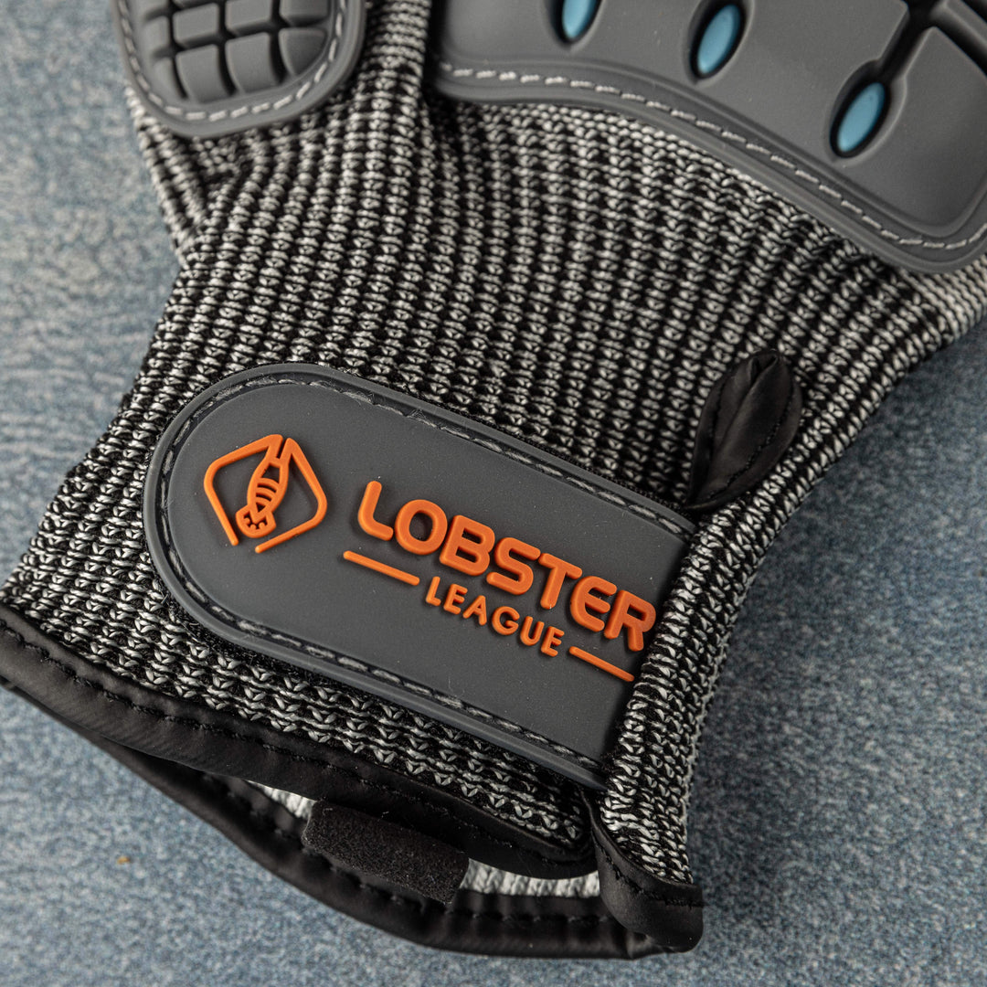 Lobstering gloves by Life League Gear for diving, freediving, spearfishing, and fishing, showing durable protective material and grip features.