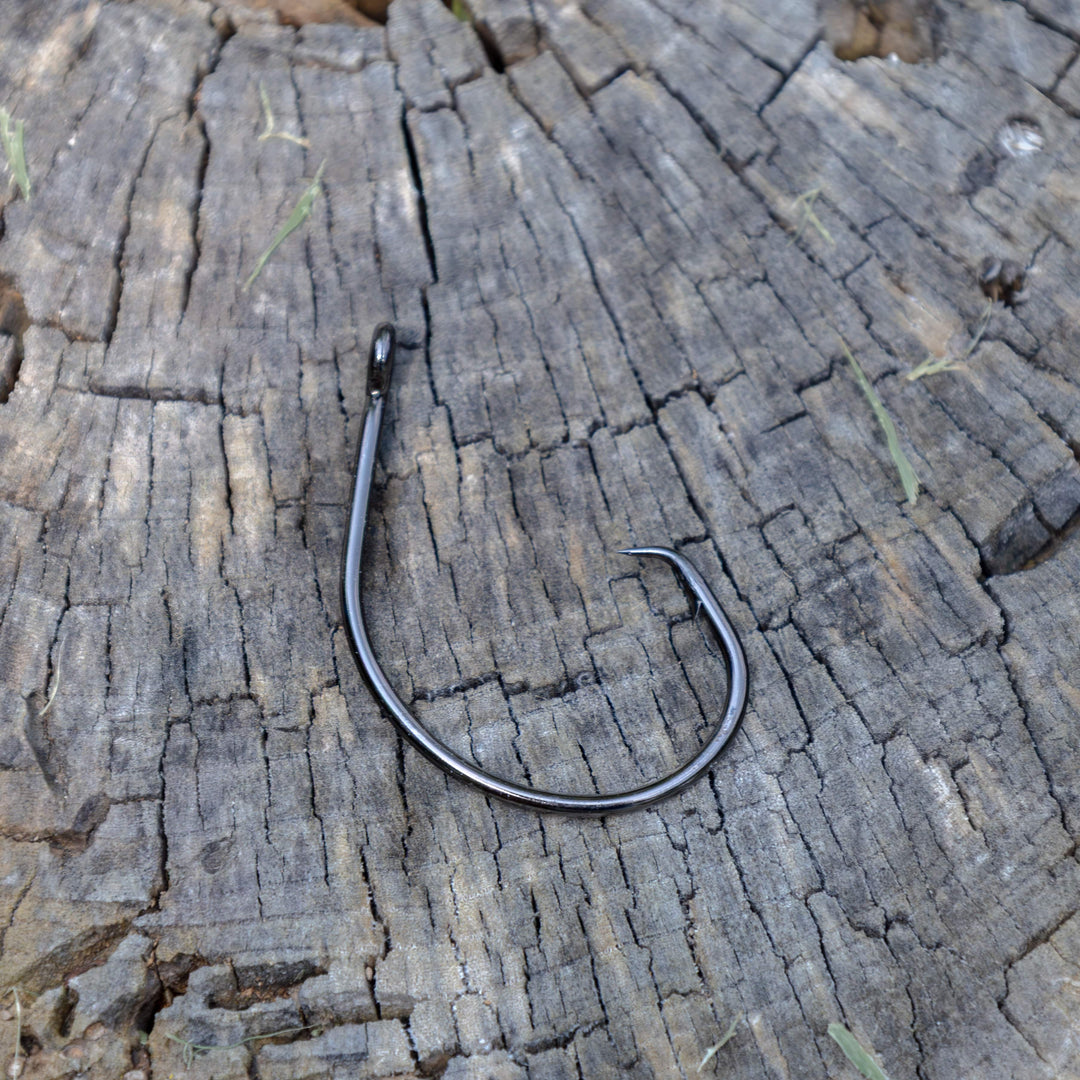Reaction Tackle Premium Circle Hooks, 25-pack, sharp fishing hooks with a circular design for secure bait hooking and effective catch retention.