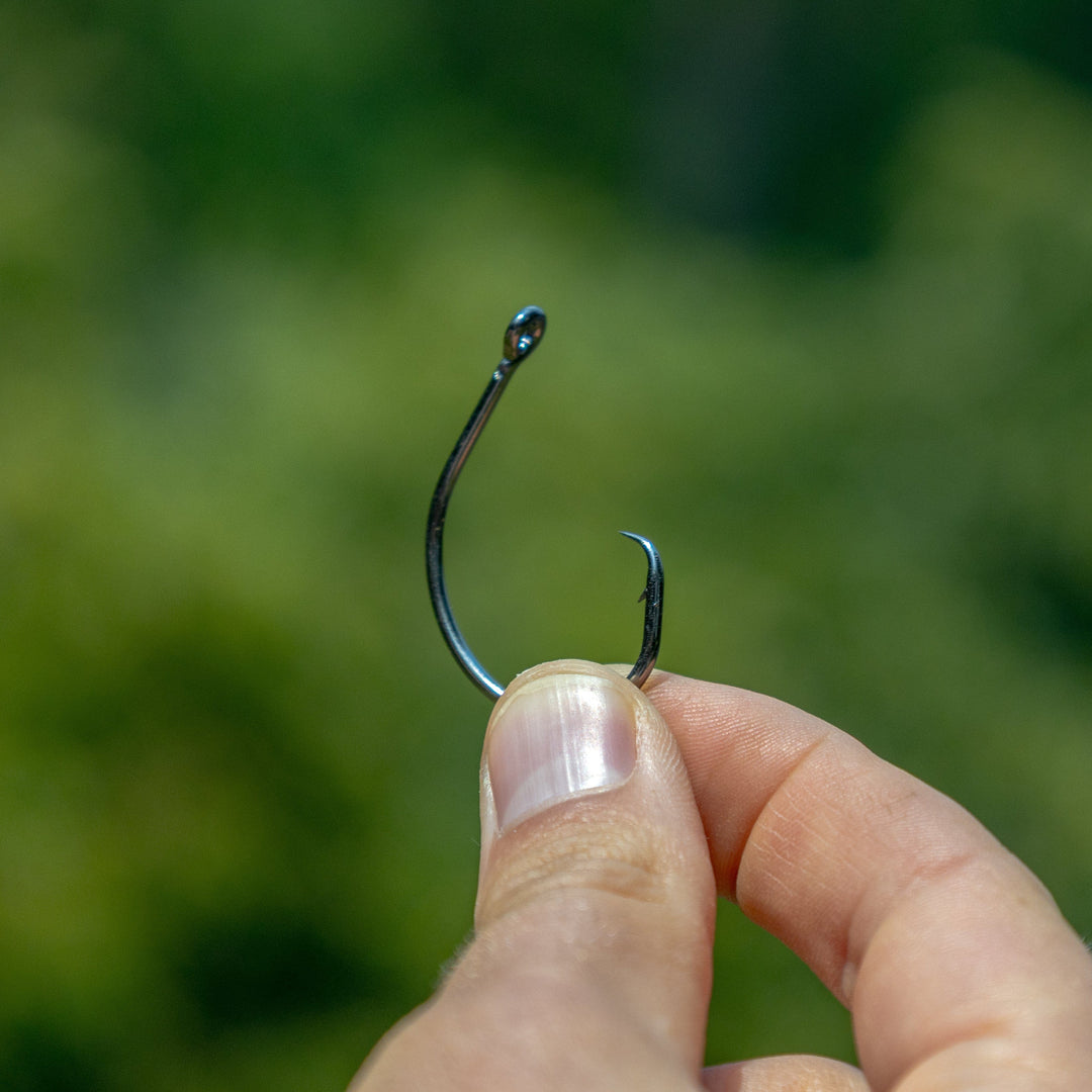 Reaction Tackle Premium Circle Hooks, 25-pack, sharp fishing hooks with a smooth, rounded design for effective catching and durability.