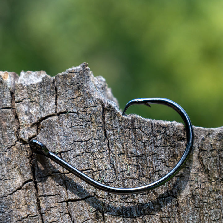 Reaction Tackle Premium Circle Hooks in a 25-pack, sharp fishing hooks for freshwater and saltwater fishing.