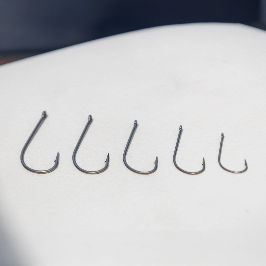 Reaction Tackle Wacky Neko Hooks, 25-pack, featuring durable hooks for fishing, shown in a close-up image.