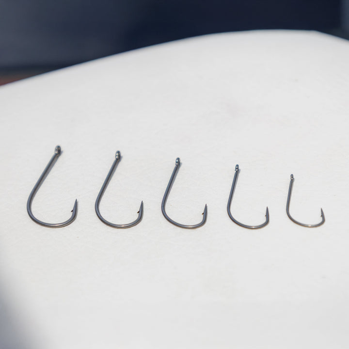 Reaction Tackle Wacky Neko Hooks, 25-pack, featuring durable hooks for fishing, shown in a close-up image.
