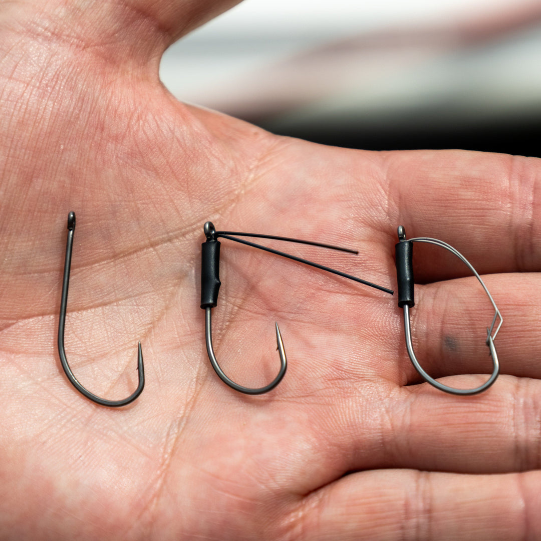 Reaction Tackle Wacky Neko Hooks 25-pack showing sharp, durable hooks ideal for fishing with soft plastic baits.