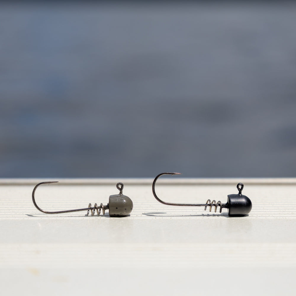 Reaction Tackle Tungsten Screw Lock Jig Heads 5-Pack, featuring durable hooks and sleek design for fishing enthusiasts.