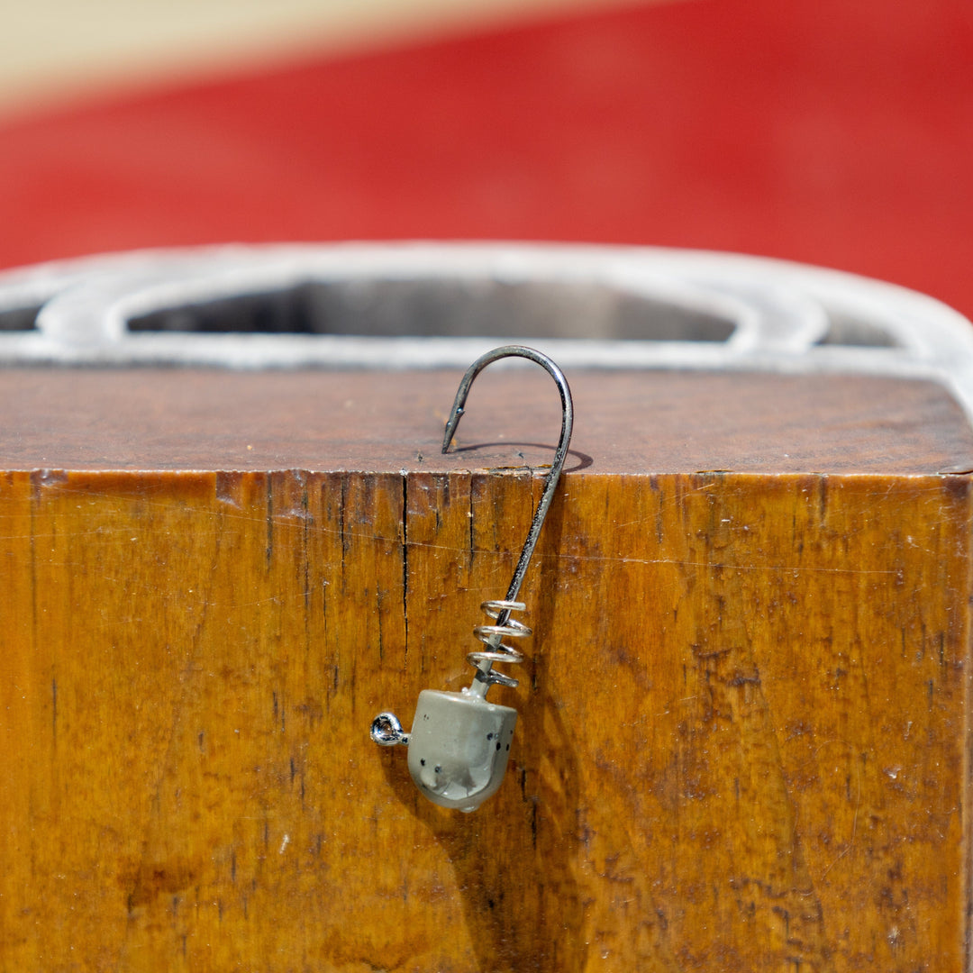 Reaction Tackle Tungsten Screw Lock Jig Heads 5-pack, featuring durable tungsten and screw lock hooks for fishing.