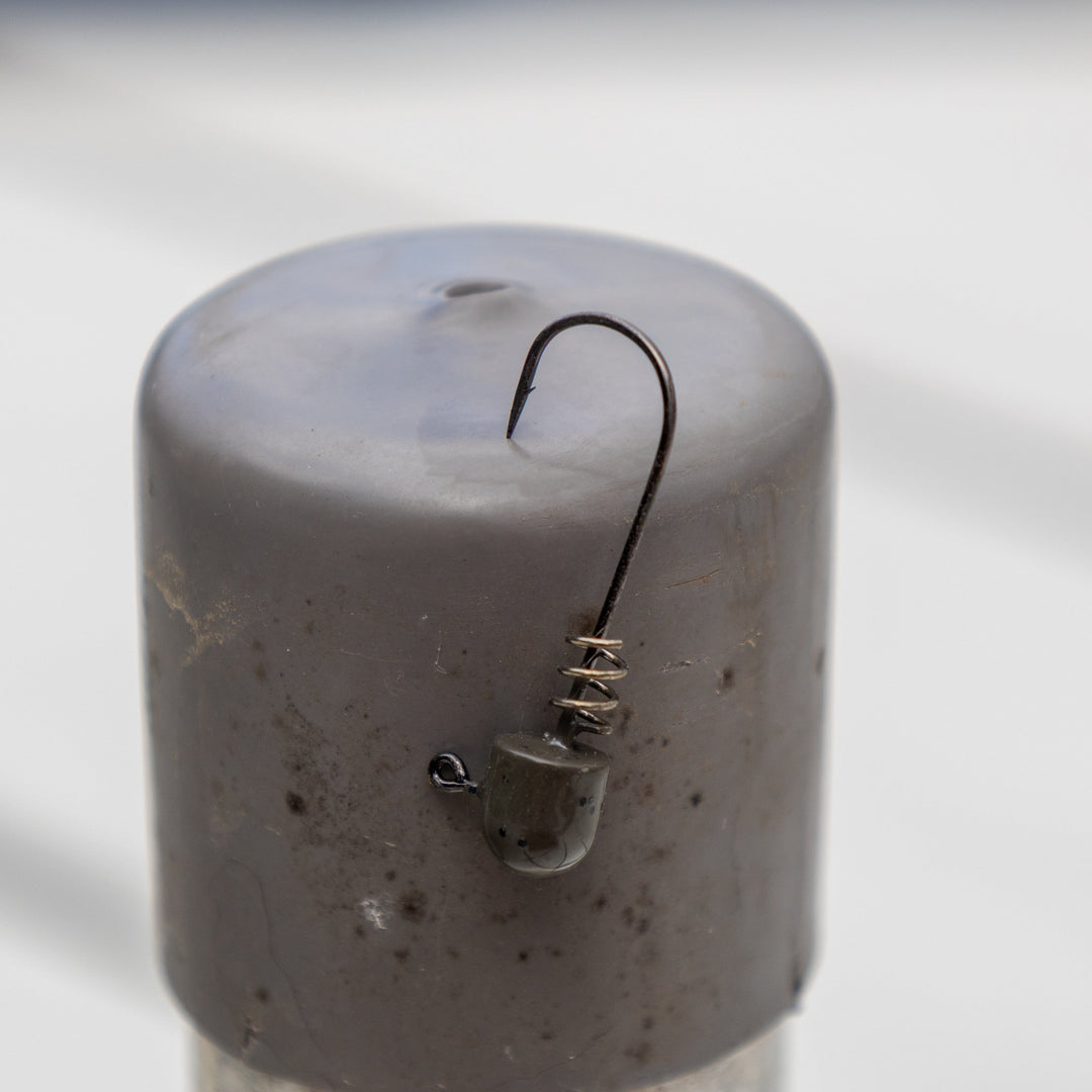 Reaction Tackle Tungsten Screw Lock Jig Heads, 5-pack, featuring durable tungsten and screw lock hooks for fishing.