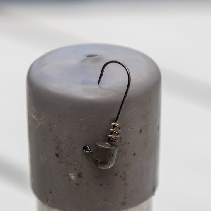 Reaction Tackle Tungsten Screw Lock Jig Heads, 5-pack, featuring durable tungsten and screw lock hooks for fishing.