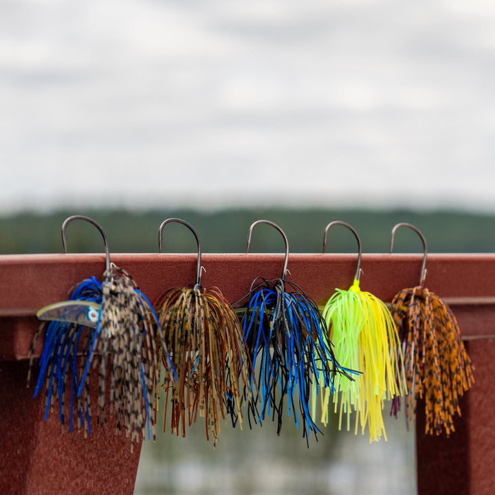 Reaction Tackle Tungsten Scrounger Jigs 2-pack, showing two sleek fishing jigs with weighted heads and hook details.