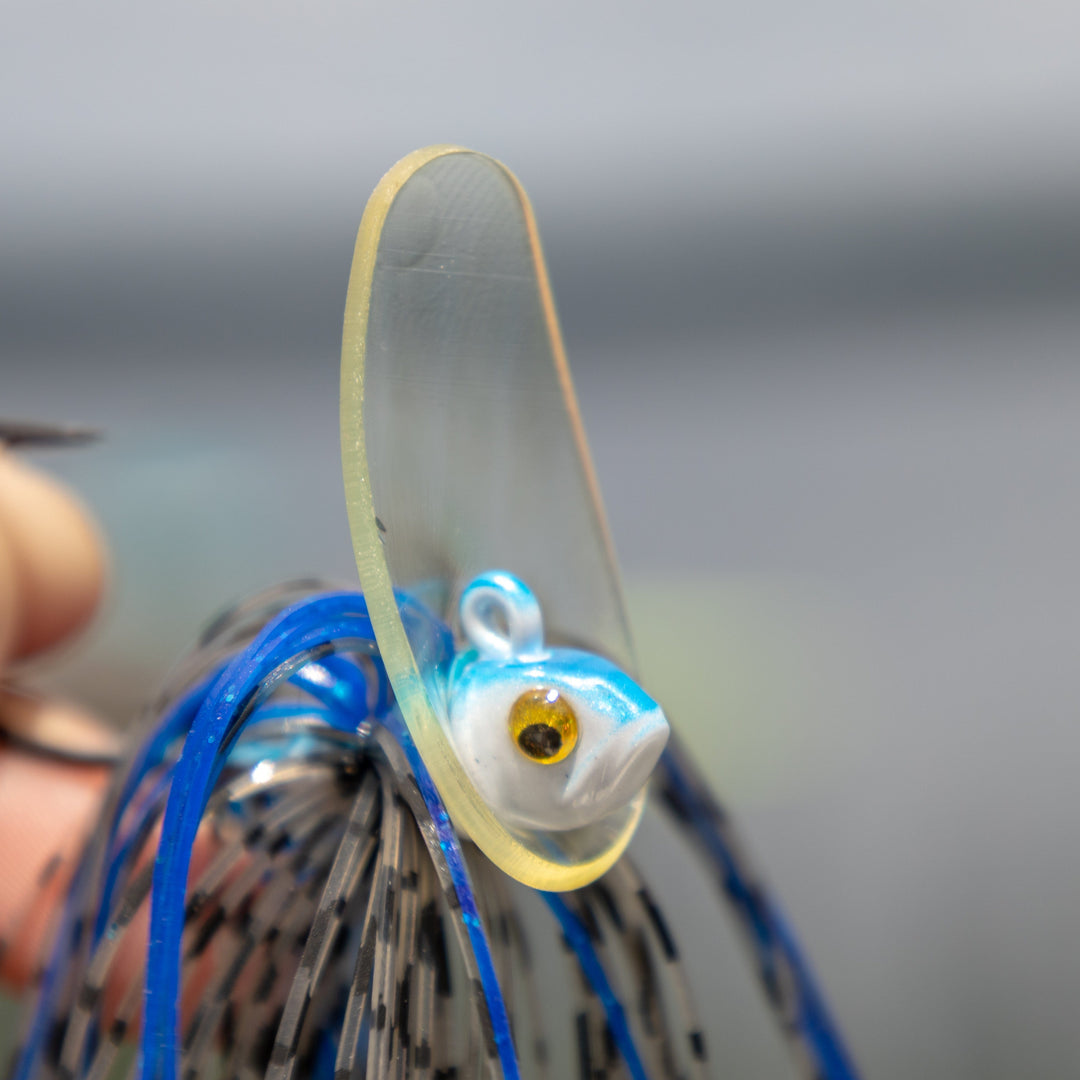 Reaction Tackle Tungsten Scrounger Jigs 2-pack, showcasing lures with detailed hooks and realistic fish-like design for fishing.
