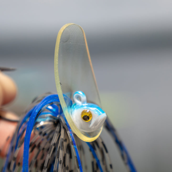 Reaction Tackle Tungsten Scrounger Jigs 2-pack, showcasing lures with detailed hooks and realistic fish-like design for fishing.