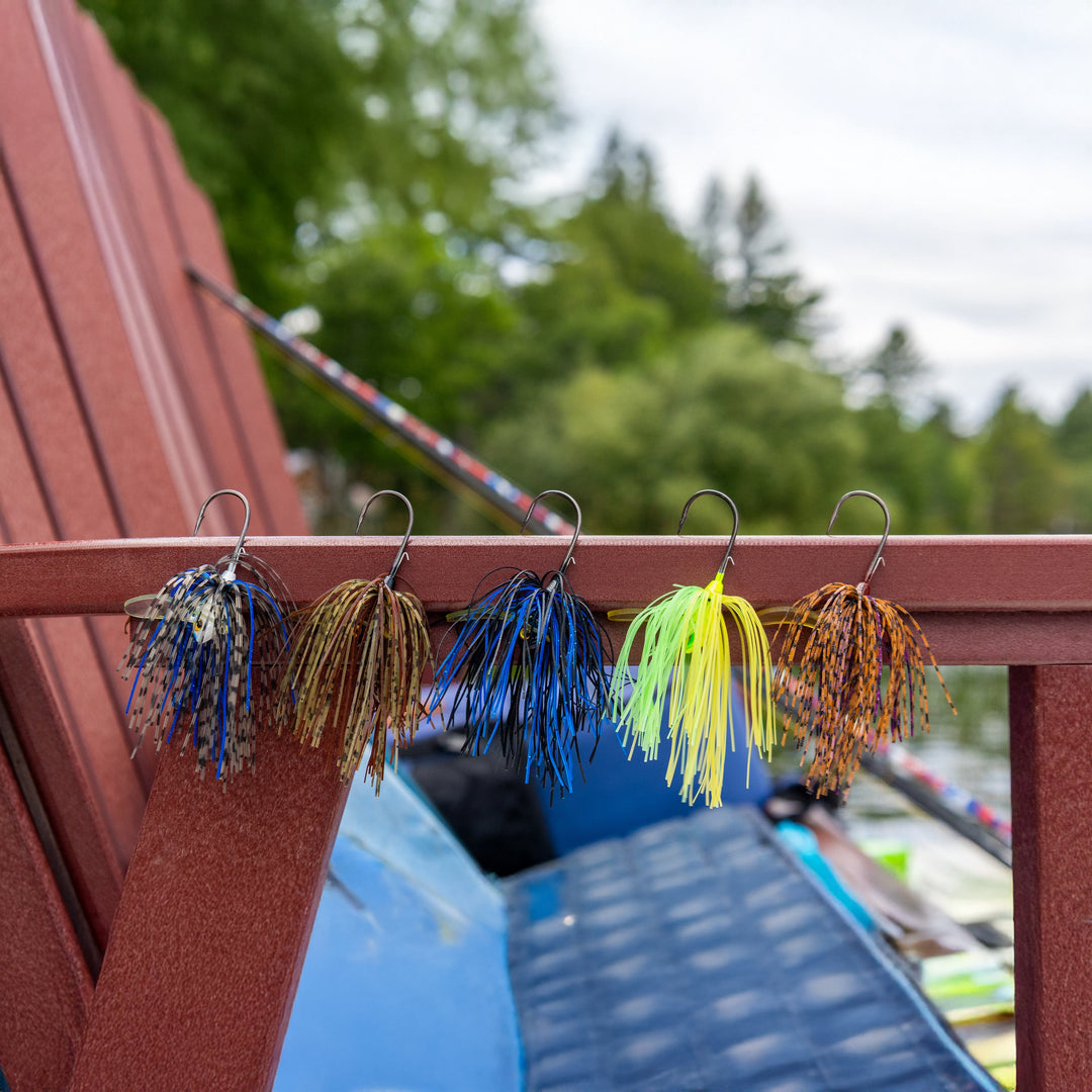 Reaction Tackle Tungsten Scrounger Jigs 2-pack, showing close-up of black and chartreuse fishing jigs with hooks.