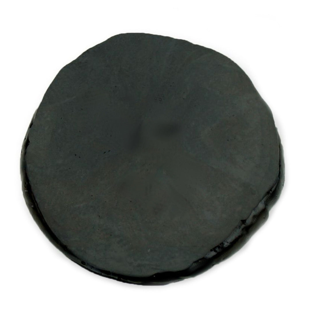 Black Reaction Tackle Tungsten Putty for fishing, shown in a close-up image with textured surface and packaging details.