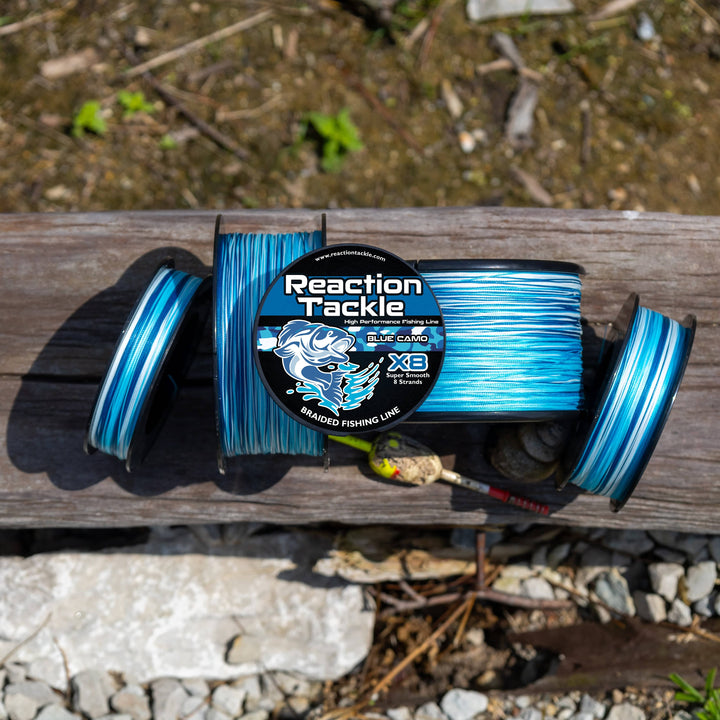 Reaction Tackle X8 Braided Fishing Line in blue camo, 8-strand, 10lb, 150 yards, designed for durability and strength.