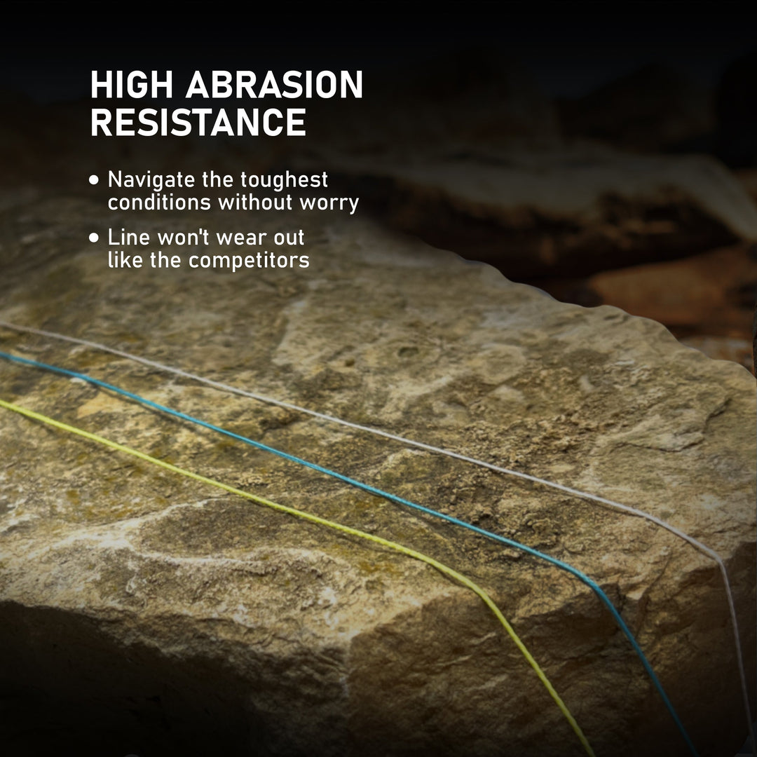 Reaction Tackle braided fishing line in no fade black, 4-strand design, close-up showing textured, durable braided fishing line.