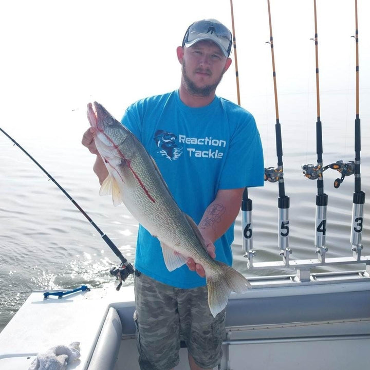Reaction Tackle fluorocarbon coated fishing line in clear, 4lb strength, 350 yards, designed for sensitive and durable fishing.