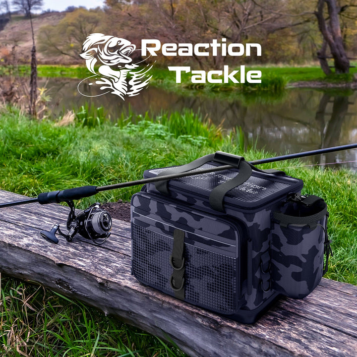 Reaction Tackle Camo Tackle Bag with multiple compartments and adjustable straps for fishing gear storage.