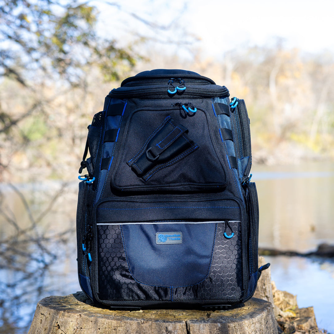 Reaction Tackle fishing tackle backpack with trays included, featuring multiple compartments for organized storage and easy access.