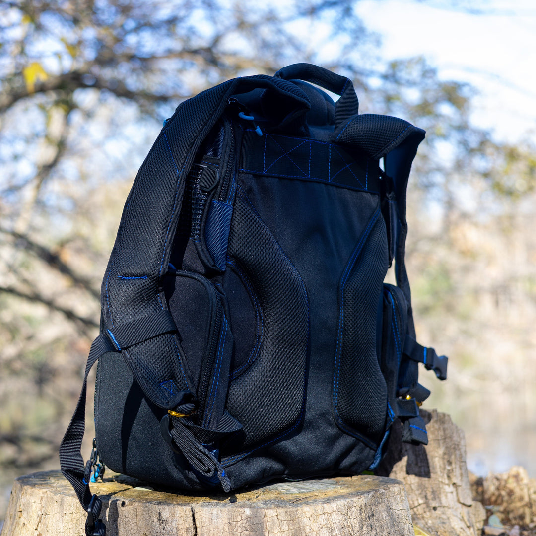 Reaction Tackle fishing tackle backpack with multiple trays, designed for organized storage of fishing gear and accessories.