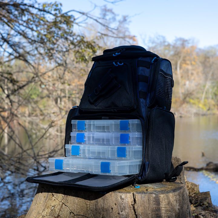 Reaction Tackle fishing tackle backpack with trays, featuring multiple compartments and adjustable straps for convenient storage.