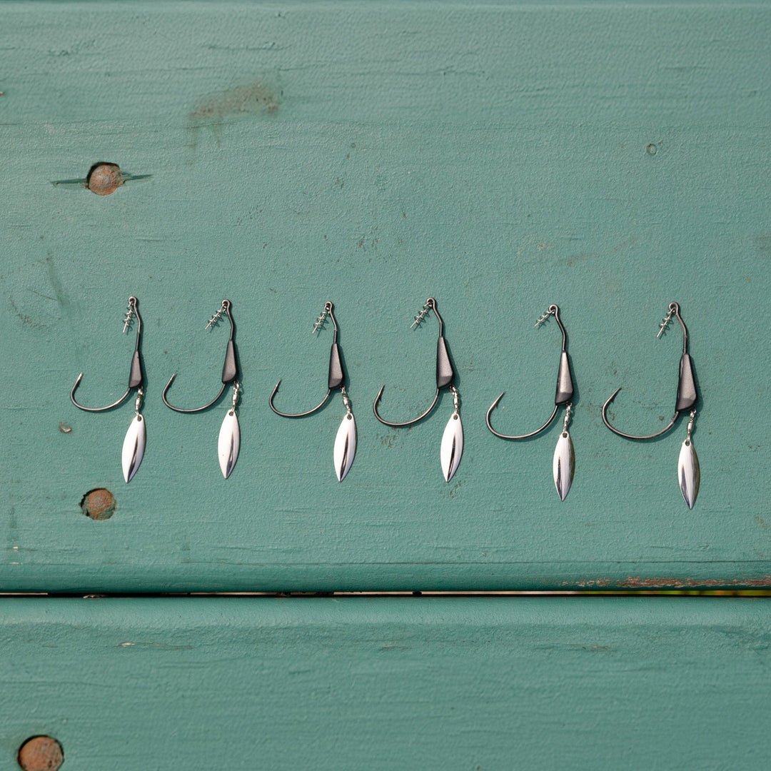Reaction Tackle bladed tungsten weighted swimbait hooks, 3-pack, fishing hooks for enhanced bait presentation and durability.