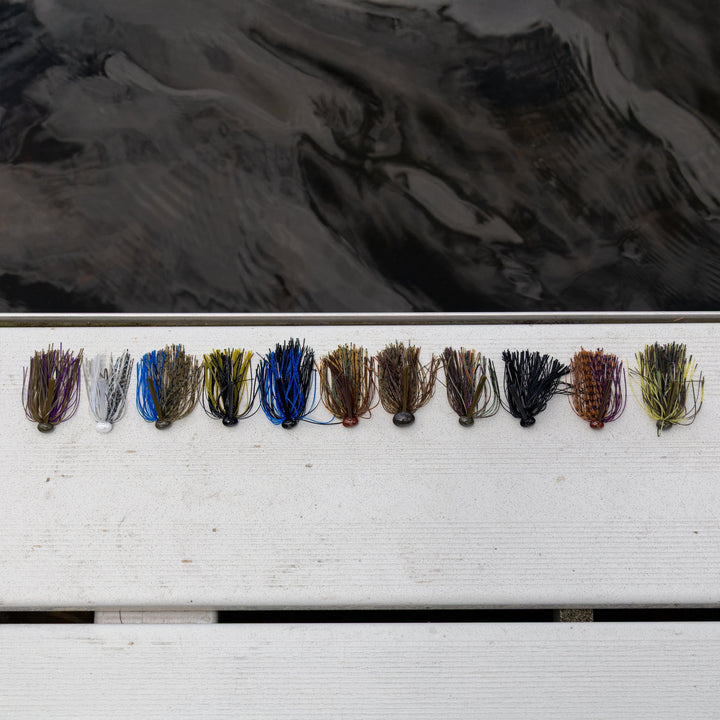 Reaction Tackle Tungsten Football Jigs in black, 1/4 oz, 2-pack, ideal for fishing with durable tungsten construction