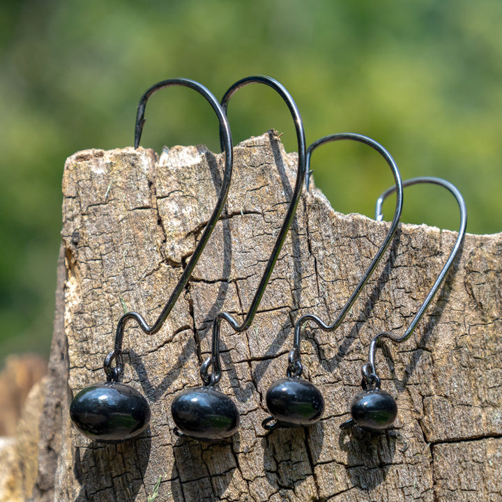 Reaction Tackle Tungsten Football and Swing Jig Heads, 3-pack, with detailed hooks for fishing success.