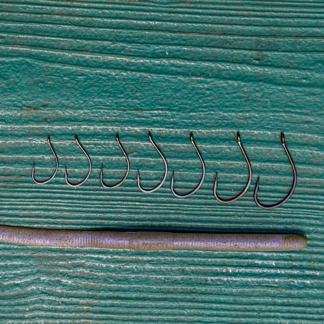 Reaction Tackle Drop Shot Hooks in black, pack of 50, showing close-up of sharp, durable hooks for fishing.