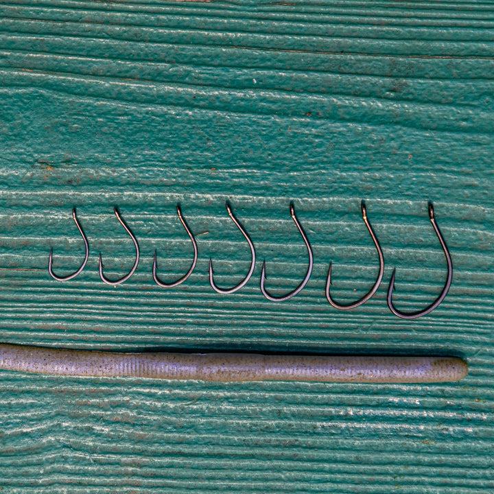Reaction Tackle Drop Shot Hooks in black, pack of 50, showing close-up of sharp, durable hooks for fishing.