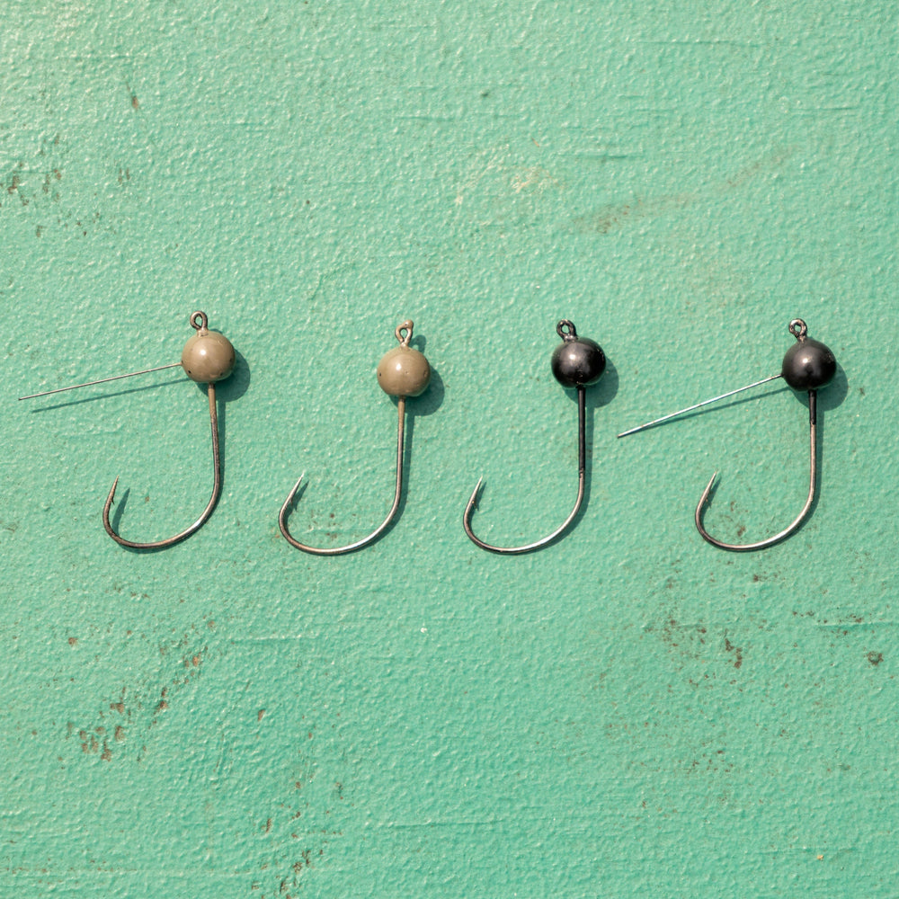 Reaction Tackle Tungsten Wacky Jig Heads, 5-pack, black, 1/16 oz, fishing jigs with durable tungsten tips for bass fishing.