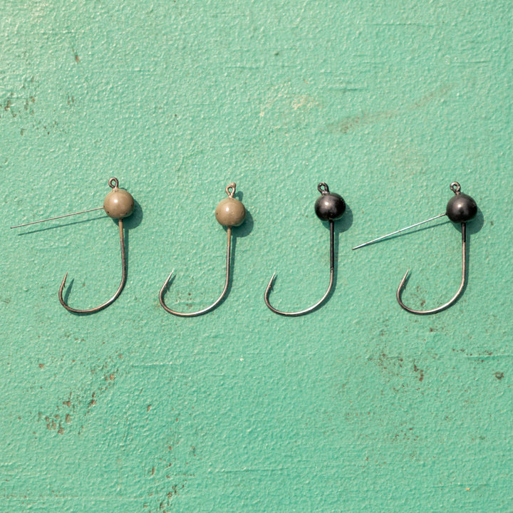 Reaction Tackle Tungsten Wacky Jig Heads, 5-pack, black, 1/16 oz, fishing jigs with durable tungsten tips for bass fishing.
