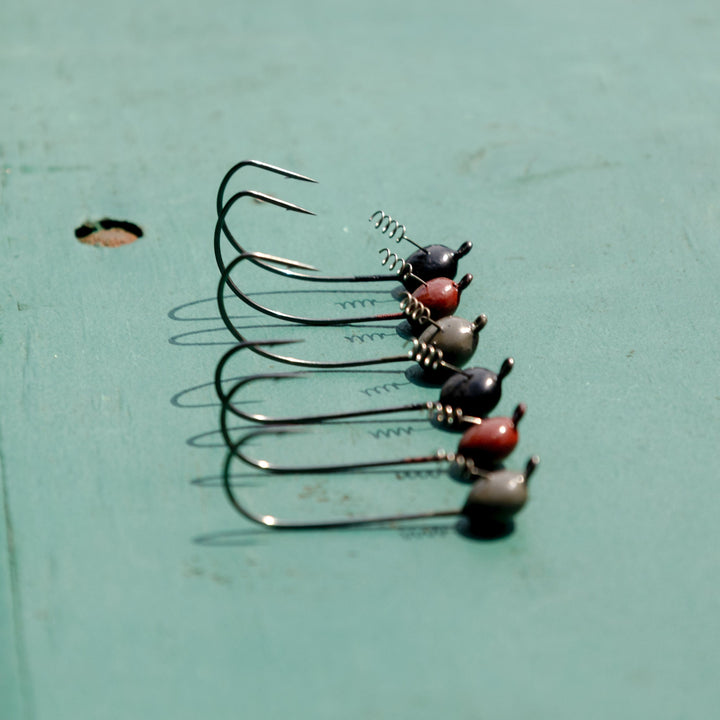 Reaction Tackle Tungsten Shaky Head Jigs 5-pack in green pumpkin, 1/16 oz, designed for finesse fishing on freshwater bass.