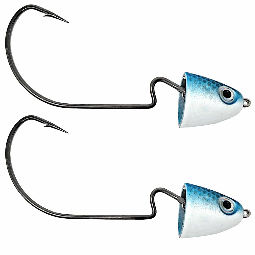 Reaction Tackle tungsten swing and swimbait jig heads with blue finish, designed for fishing lures and bait presentation.