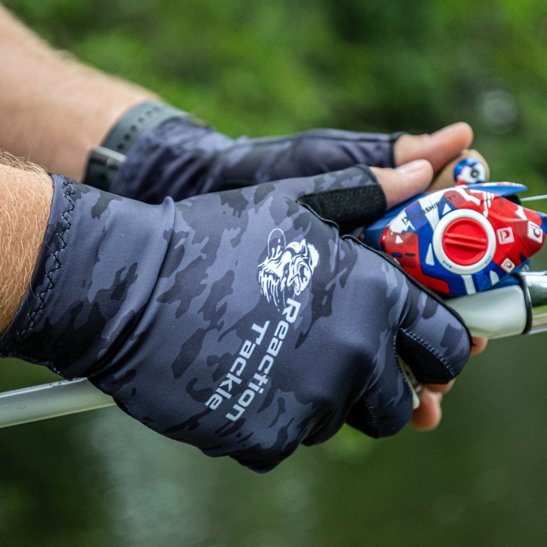 Reaction Tackle UV fishing gloves UPF 50+ in small size, featuring flexible material and reinforced palms for outdoor fishing.