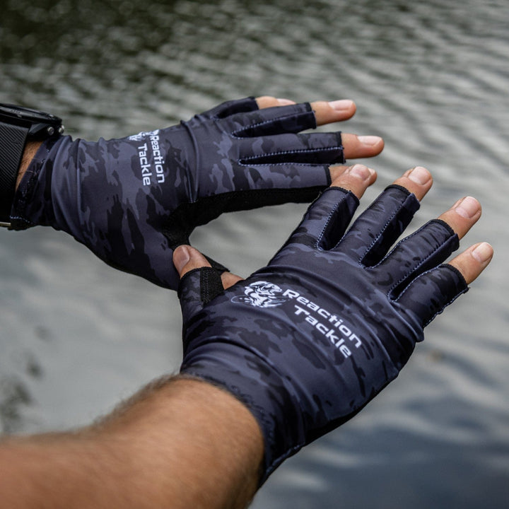 Reaction Tackle UV fishing gloves UPF 50+ in size small, showing lightweight fabric and protective design for anglers