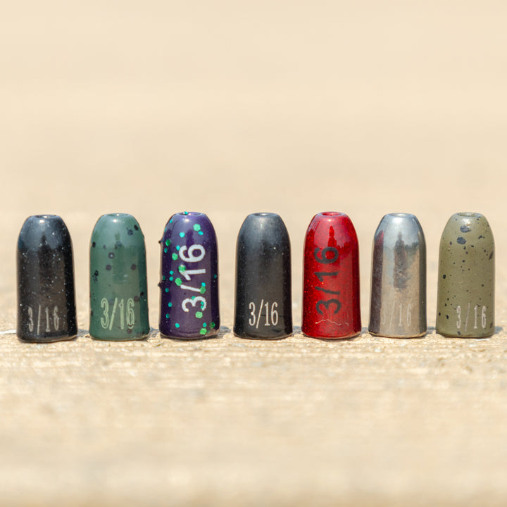 Reaction Tackle tungsten worm weights, green pumpkin bullet-shaped sinkers, 1/16 oz, pack of 12 for fishing tackle and bait presentation.