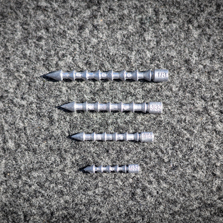 Reaction Tackle tungsten lead nail weights used as insert sinkers for fishing, shown in a close-up image.