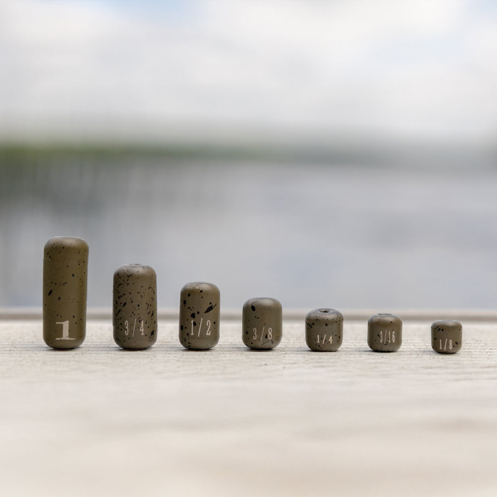 Reaction Tackle tungsten barrel weights in silver, 1/8 oz, pack of 8, designed for fishing applications.