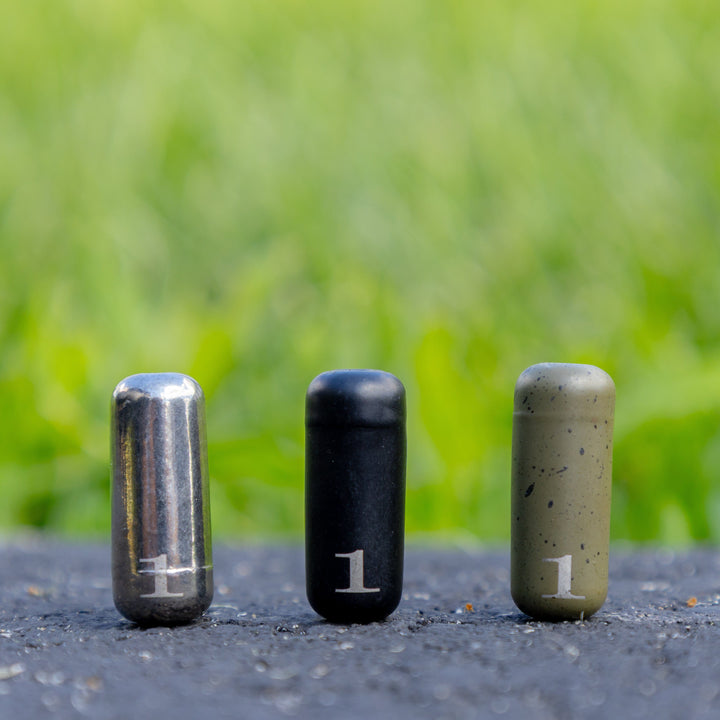 Reaction Tackle Tungsten Barrel Weights in silver, 1/8 oz, pack of 8, designed for fishing and bait presentation.