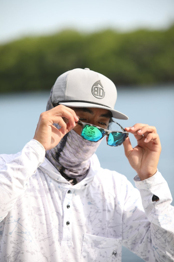 RedFin Polarized Hatteras fishing sunglasses with black frames and polarized lenses, designed for outdoor water activities.