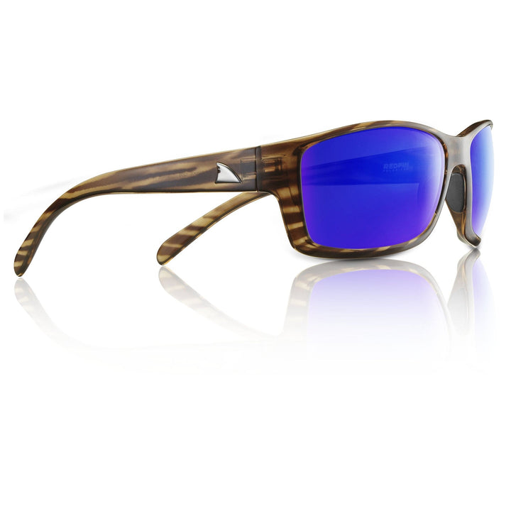 RedFin Polarized Outer Banks fishing sunglasses with matte honey drift frames and amber-green polarized lenses.