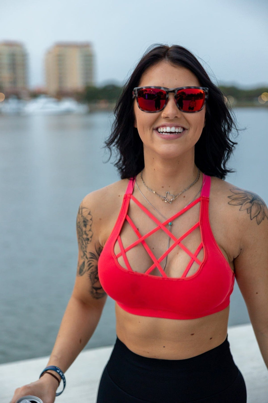 RedFin Polarized Tybee fishing sunglasses with matte honey drift frame and blue lenses, designed for outdoor and water activities.