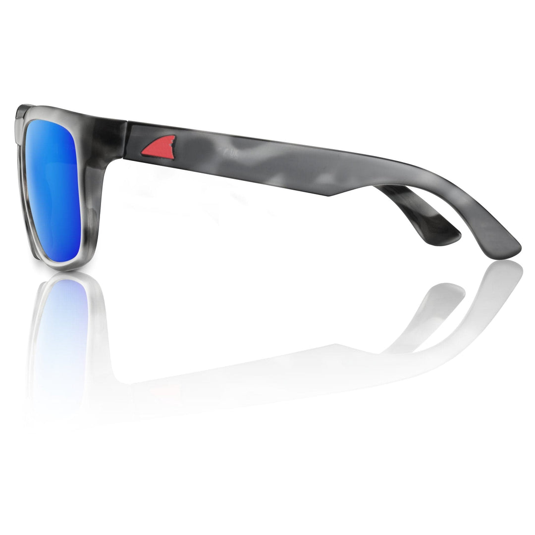 RedFin Polarized Tybee fishing sunglasses with matte honey drift frame and Gulf blue lenses for outdoor fishing.
