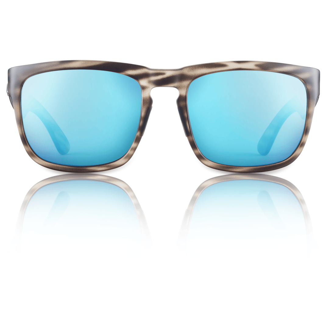 RedFin Polarized Tybee fishing sunglasses with matte honey drift frames and blue lenses, designed for outdoor fishing activities.