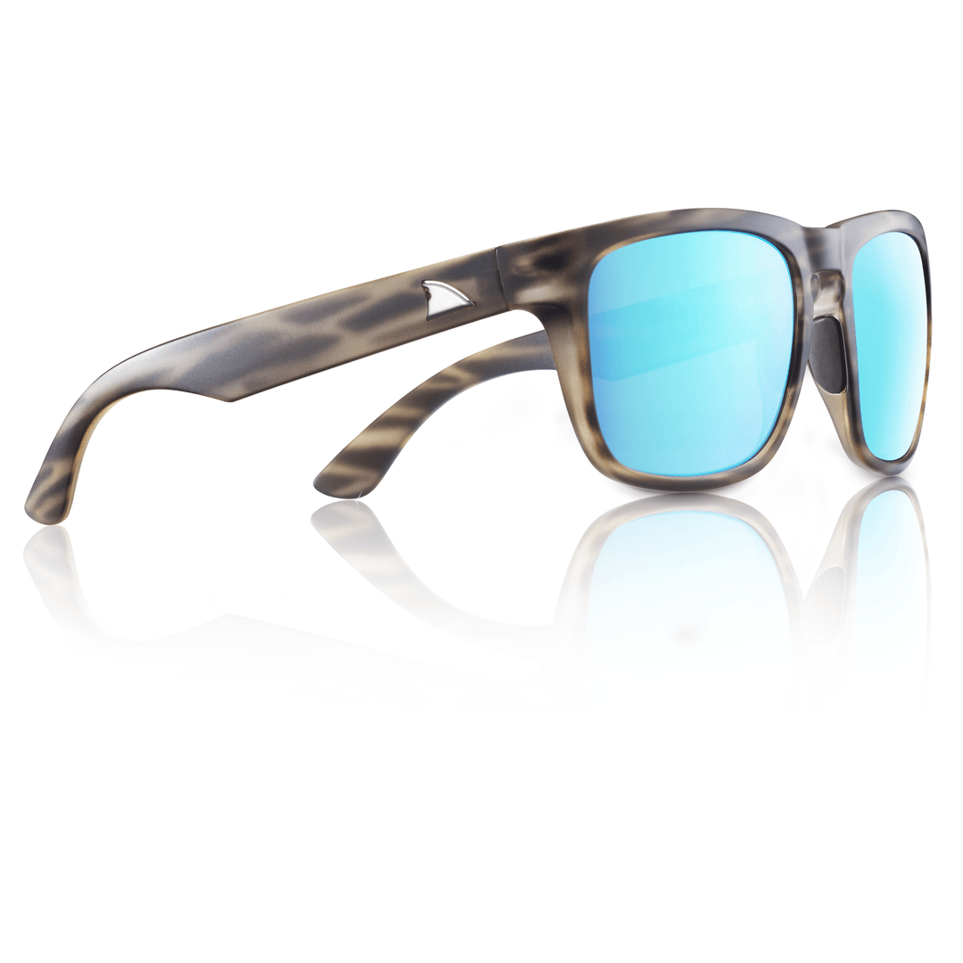 RedFin Polarized Tybee fishing sunglasses with matte honey drift frame and blue lenses, designed for outdoor fishing activities.