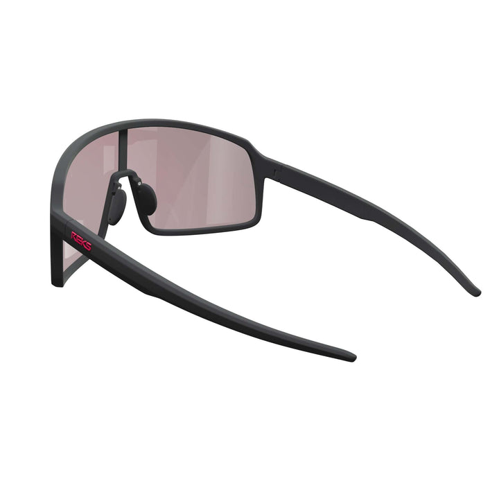 REKS® K-Shield contrast photochromic sunglasses with black frame, showcasing sleek design and tinted lenses in a close-up image.