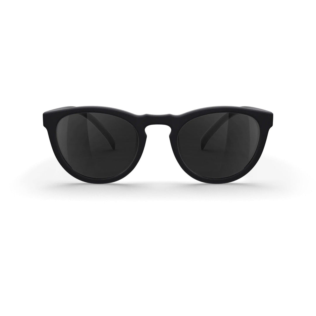REKS® round polarized polycarbonate sunglasses with rose amber lenses, stylish and protective eyewear for sunny days.