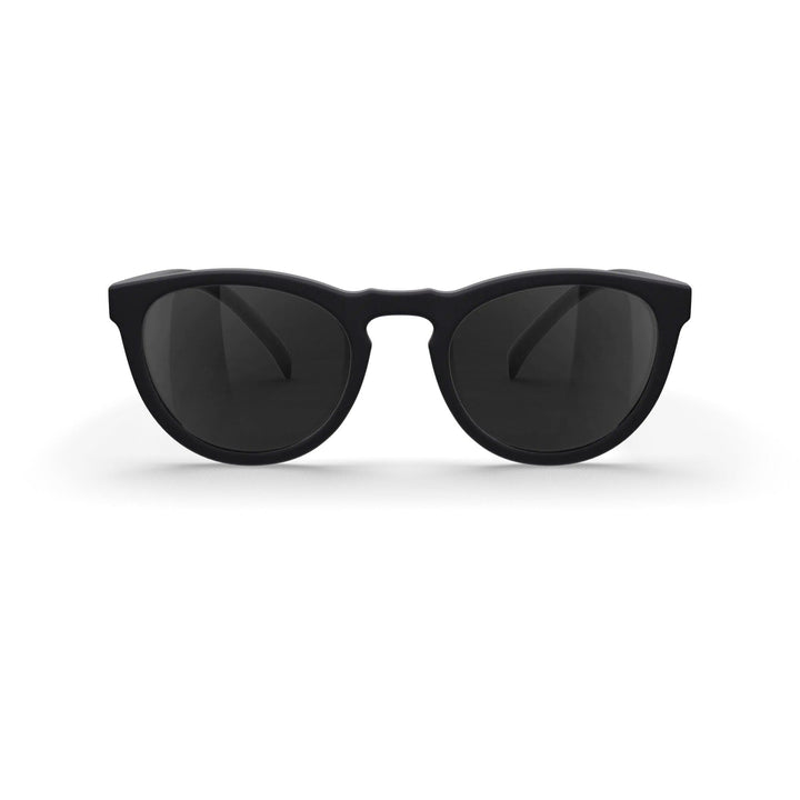 REKS® round polarized polycarbonate sunglasses with rose amber lenses, stylish and protective eyewear for sunny days.
