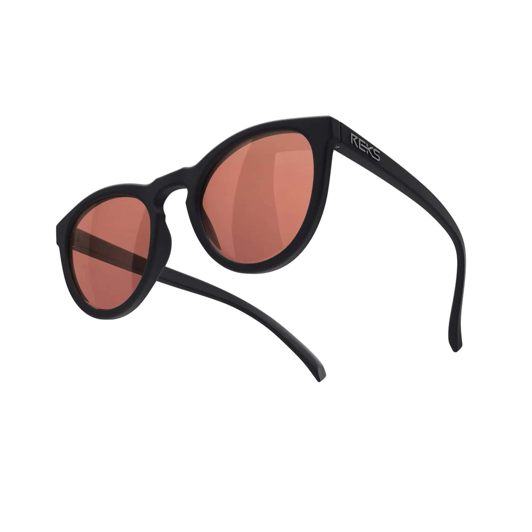Round REKS® polarized sunglasses with rose amber polycarbonate lenses, showcasing a stylish round frame and tinted lenses.